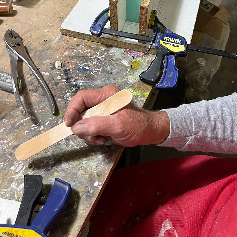 Tom preparing musky bait epoxy mixture