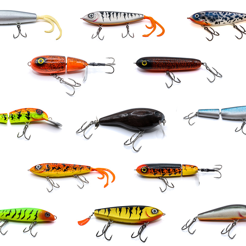 Table full of Tom's Custom Musky Baits
